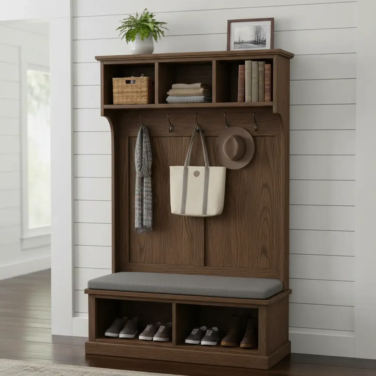 A beautifully organized hall tree in a modern farmhouse entryway
